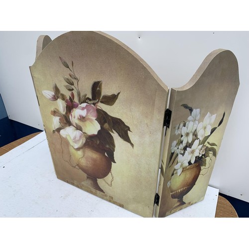 136 - A FLORAL PATTERN FOLDING CANVAS