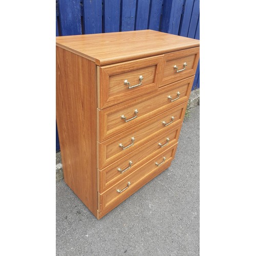 299 - AN OAK FINISHED 2 OVER 4 CHEST OF DRAWERS