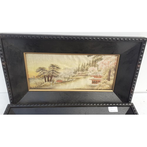 335 - A PAIR OF EBONY FRAMED HAND MADE SILK TAPESTRY PICTURES