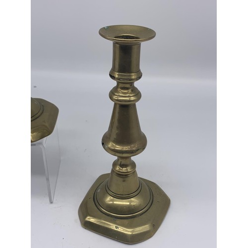 185 - A PAIR OF OLD BRASS CANDLESTICKS 7