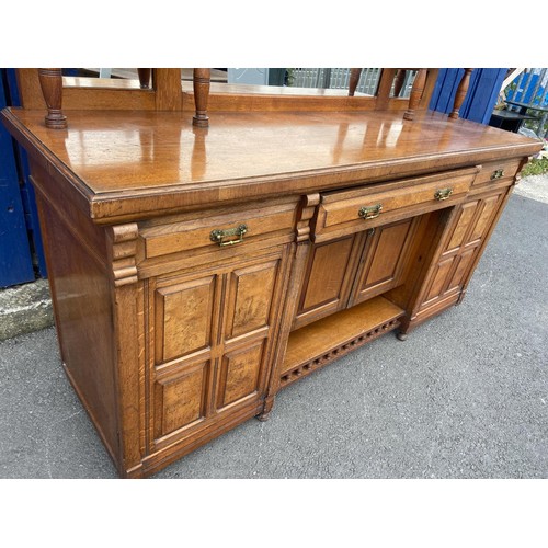 328 - AN ANTIQUE OAK MIRRORED BACKED SIDEBOARD