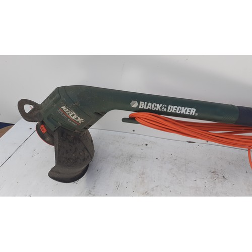 21 - A BLACK AND DECKER STRIMMER