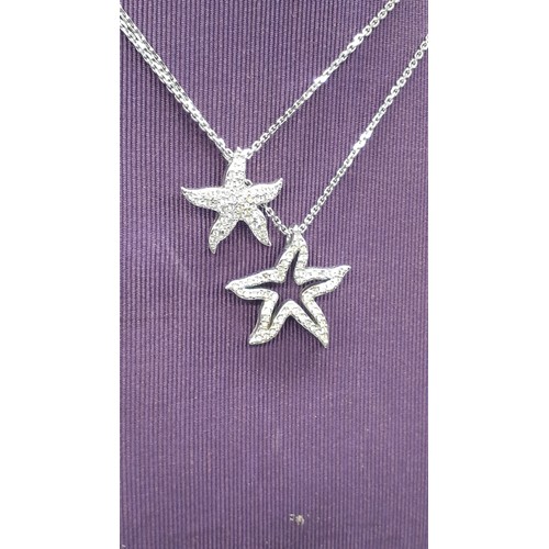 279 - A BOXED SWAROFSKI DOUBLE STAR PENDANT NECKLACE