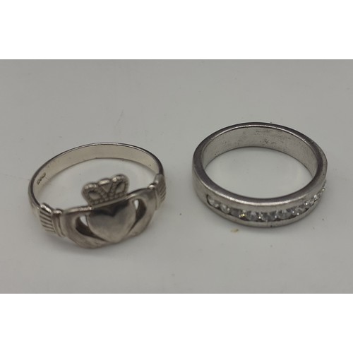 257 - A SILVER CLADDAGH RING AND SILVER ETERNITY RING