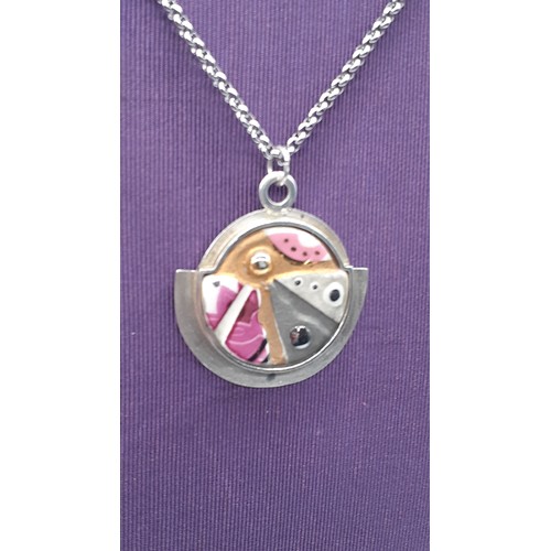 246 - A HALLMARKED SILVER AND ENAMEL PENDANT ON SILVER CHAIN