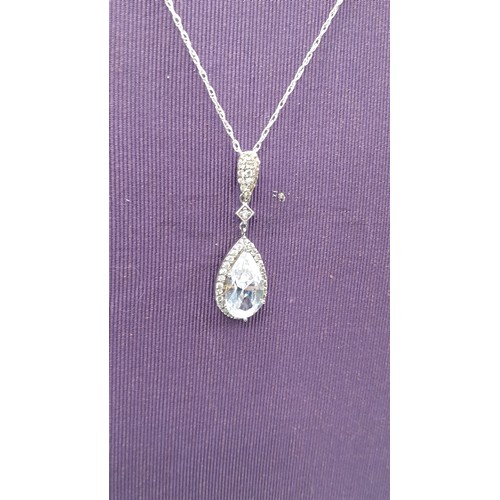 250 - A SILVER TEARDROP PENDANT ON SILVER CHAIN