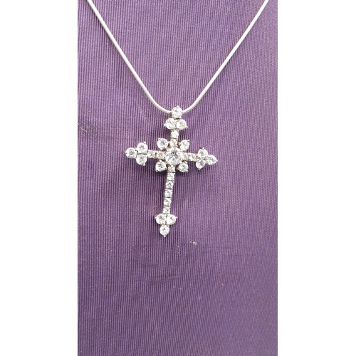 264 - A SILVER CRYSTAL SET CROSS ON SILVER CHAIN