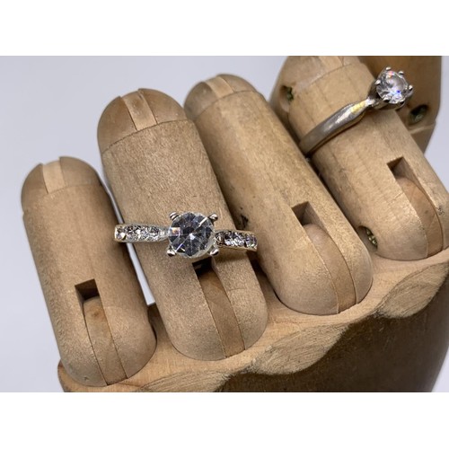 354 - 2 SOLITAIRE DRESS RINGS