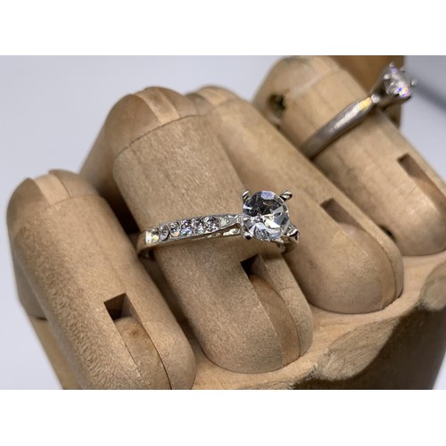 354 - 2 SOLITAIRE DRESS RINGS