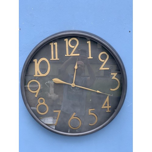 367 - A NEW GUN METAL CLOCK WITH GOLD HANDS/ NUMBERS MEASURES APPROX 30