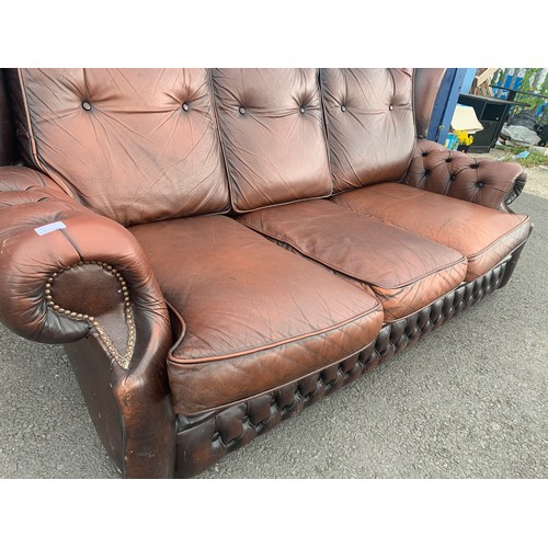 74 - BROWN LEATHER BUTTONED SOFA