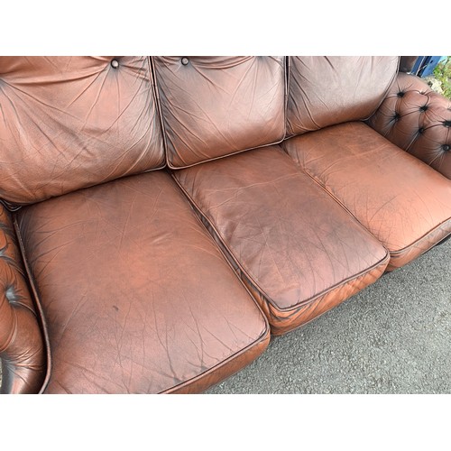 74 - BROWN LEATHER BUTTONED SOFA