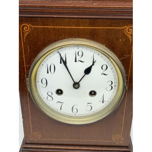 50 - AN INLAID MAHOGANY MANTLE CLOCK