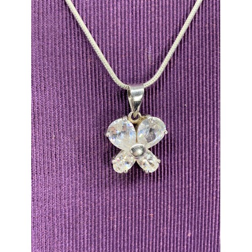 614 - SILVER GEM SET BUTTERFLY SYLE PENDNANT ON A SILVER CHAIN