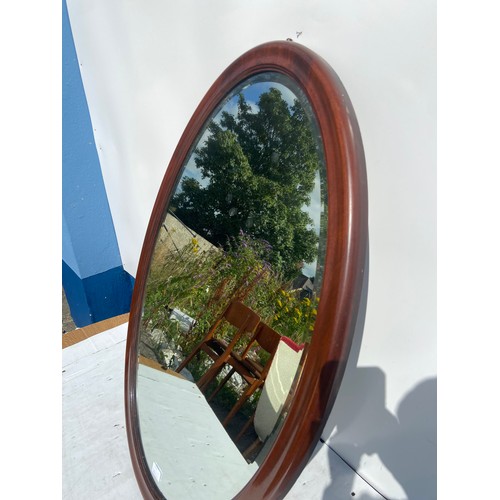 431 - ANTIQUE OVAL MAH FRAMED BEV MIRROR 38X26