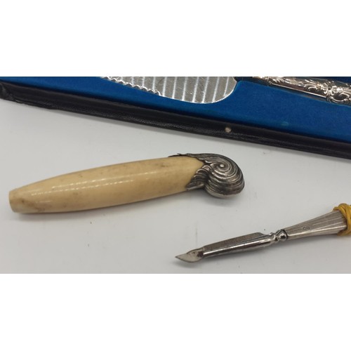 496 - A SILVER HANDLED CAKESLICE BOXED A SILVER MOUNTED UMBRELLA HANDLE & 2 SILVER HANDLED MANICURE ITEMS