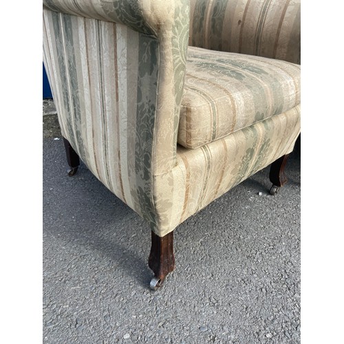 525 - A PAIR OF GEORGIAN ARMCHAIRS ON A HEAVY FLUTE LEG