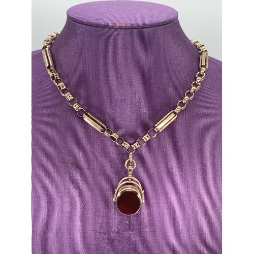 666 - AN ANTIQUE 9ct ROSE GOLD CHAIN WITH ROSE GOLD SWIVEL FOB GOLDSTONE & CORNELIAN 35.4grms 16.5