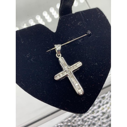 667 - 14CT WHITE GOLD DIAMOND SET CROSS 1.8G