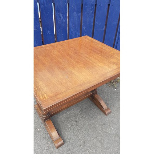 563 - A SMALL OAK DRAW LEAF TABLE