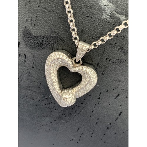 674 - DIAMOND SET HEART PENDANT WITH A BALL ALL IN 18CT GOLD WEIGHS 13.7 ON A WHITE GOLD CHAIN