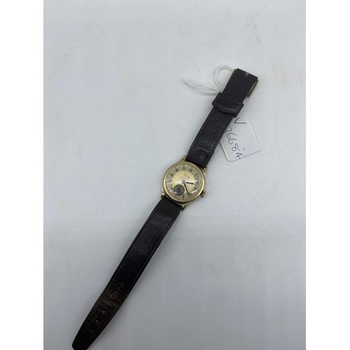 677 - A VINTAGE 9ct GOLD CYMA WATCH ON LEATHER STRAP