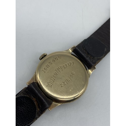 677 - A VINTAGE 9ct GOLD CYMA WATCH ON LEATHER STRAP