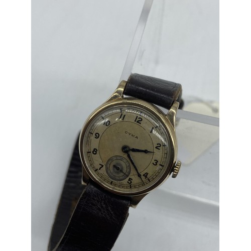 677 - A VINTAGE 9ct GOLD CYMA WATCH ON LEATHER STRAP