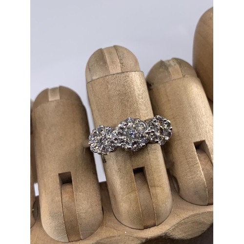 684 - STUNNING MULTI DIAMOND RING IN 18CT WHITE GOLD MAKES UP 3 DIASY STYLE PATTERNS