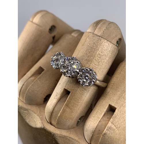 684 - STUNNING MULTI DIAMOND RING IN 18CT WHITE GOLD MAKES UP 3 DIASY STYLE PATTERNS