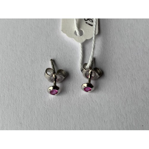 687 - RUBY BUTTON SHAPED SMALL EARRINGS IN 18CT WHITE GOLD STAMPED 750