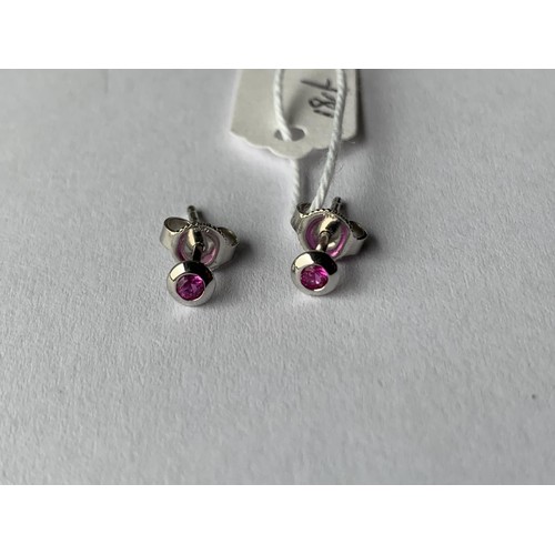 687 - RUBY BUTTON SHAPED SMALL EARRINGS IN 18CT WHITE GOLD STAMPED 750