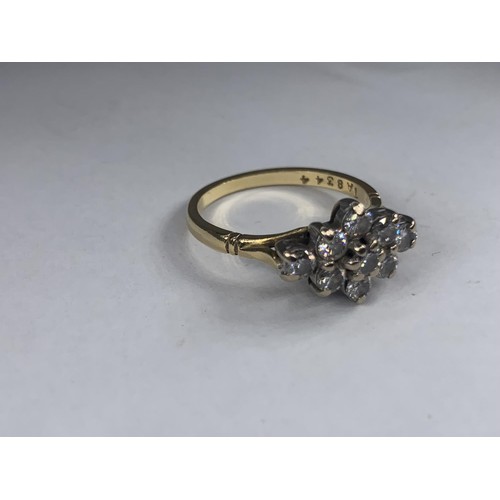 690 - STUNNING 18CT 9 STONE BOAT STYLE RING