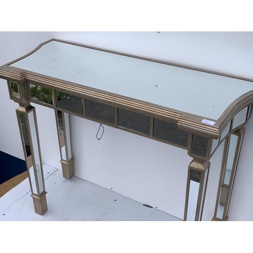 463 - A MULTI PANELLED MIRRORED HALL TABLE 39X15.5X31