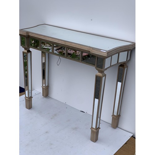 463 - A MULTI PANELLED MIRRORED HALL TABLE 39X15.5X31