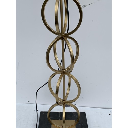 481 - A DESIGNER STYLE GILT STANDARD LAMP ( RING COLUMN)   ON MARBLE BASE 58