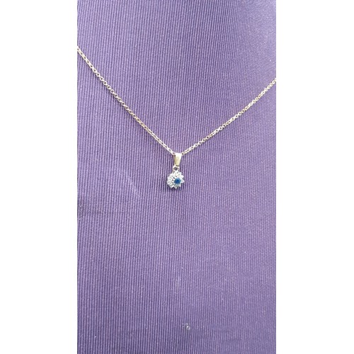 691 - A 9ct GOLD NECKLACE SET WITH A DIAMOND AND SAPPHIRE FOB