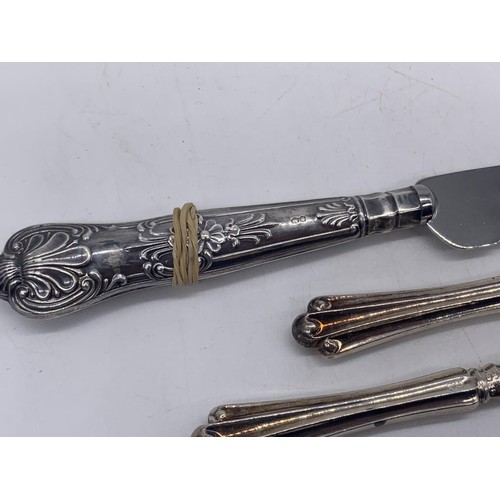 513 - SILVER HANDLED BREAK KNIFE & 2 SILVER HANDLED BUTTER KNIVES