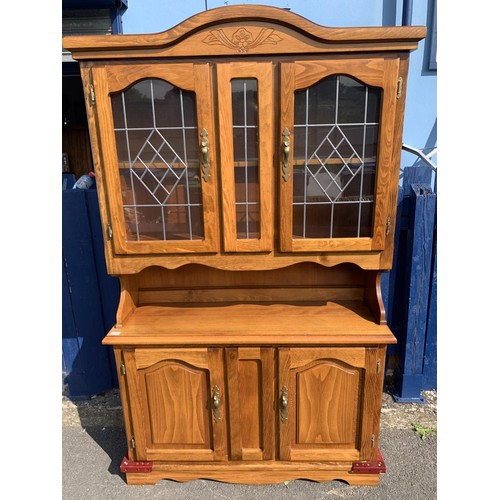 518 - AN OAK GLAZED DRESSER DOUBLE DOOR (REPAIRS TO BASE)