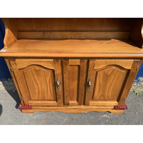 518 - AN OAK GLAZED DRESSER DOUBLE DOOR (REPAIRS TO BASE)