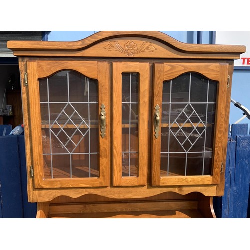 518 - AN OAK GLAZED DRESSER DOUBLE DOOR (REPAIRS TO BASE)