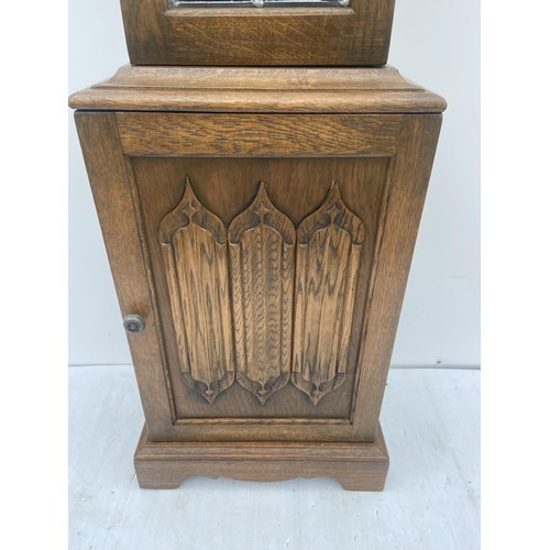 535 - A TRIPLE WEIGHT CARVED OAK GRANDFATHER CLOCK