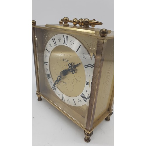 713 - A BRASS CARRIAGE CLOCK