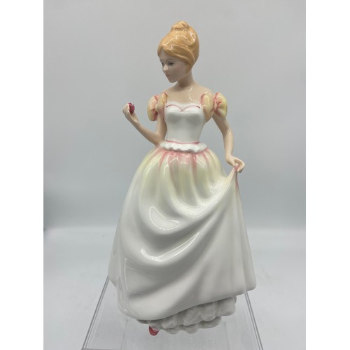 714 - A ROYAL DOULTON FIGURE GIFT OF LOVE 8IN TALL