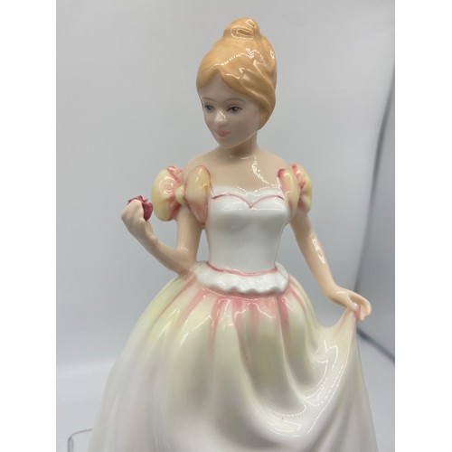 714 - A ROYAL DOULTON FIGURE GIFT OF LOVE 8IN TALL