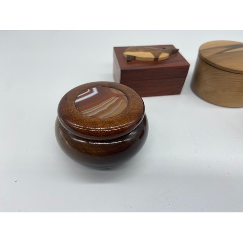 585 - 4 WOODEN TRINKET BOXES