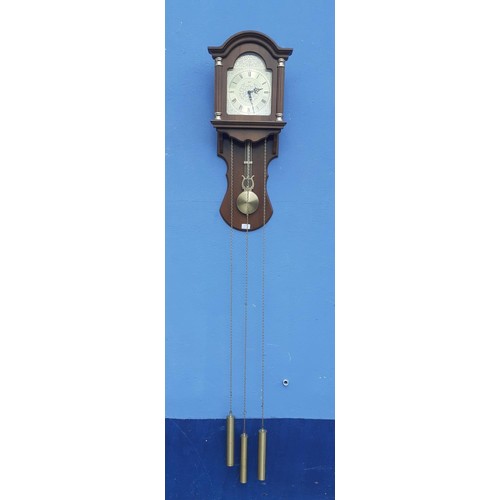 747 - A HOODED MAHOGANY TRIPLE WEIGHT WALL CLOCK