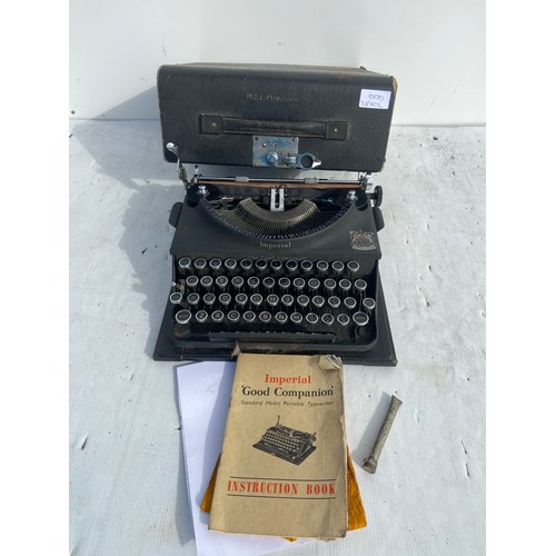 753 - A VINTAGE IMPERIAL TYPEWRITER IN CASE