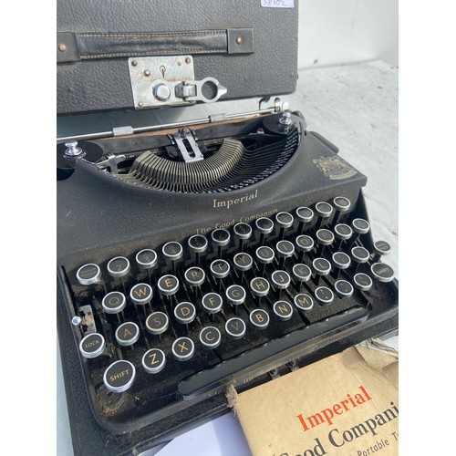 753 - A VINTAGE IMPERIAL TYPEWRITER IN CASE