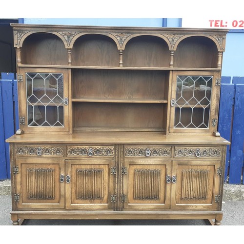 761 - AN ARCHED TOP OLD CHARM DRESSER WITH 2 LEADED GLASS DOORS 73 X 73 X 19IN